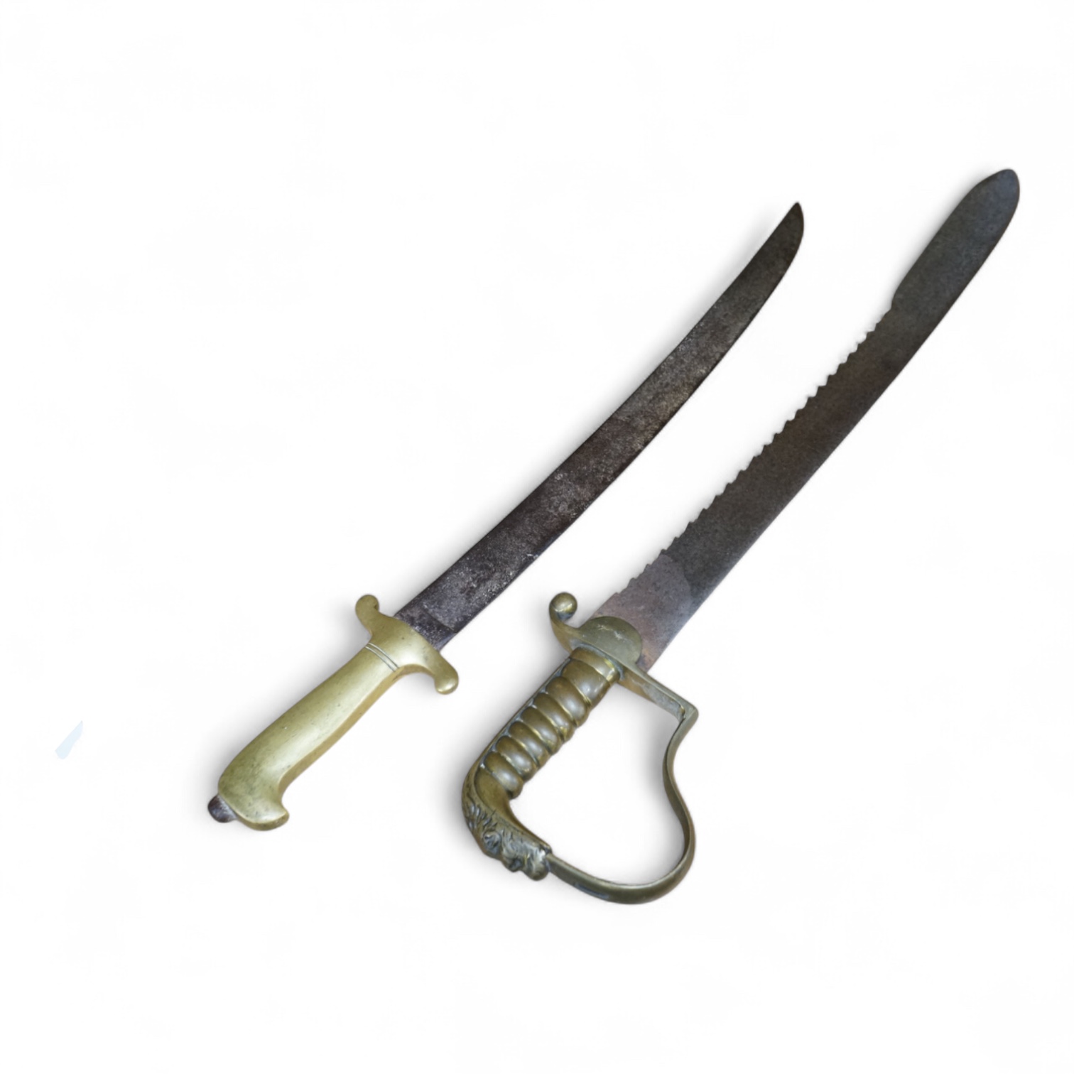 A British Pioneer’s sidearm with brass stirrup hilt, lion’s head pommel and sawback blade, together with an Imperial German sidearm with one piece brass hilt and slightly curved single edge blade